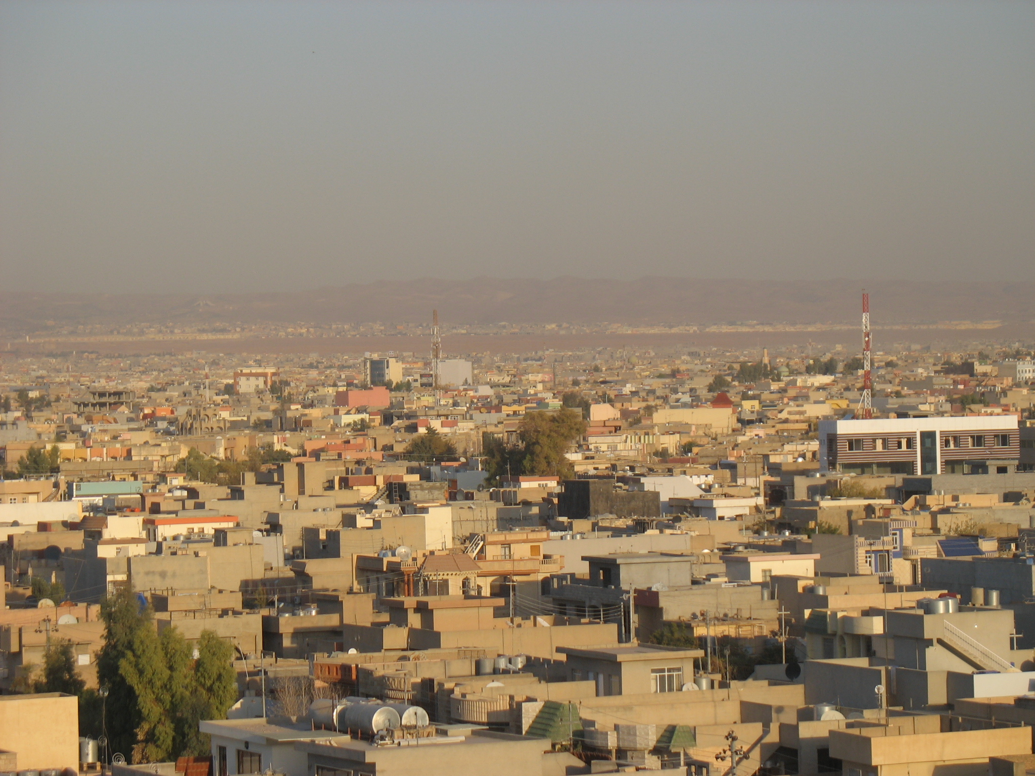 View of a city with a dusty sky.