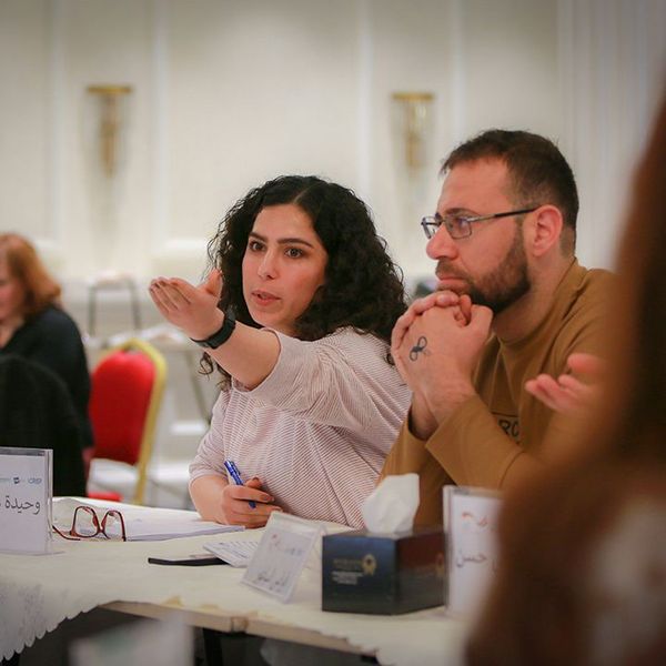 Participants of the Young Enumerators and Mediators capacity development project in Iraq during one of the training sessions