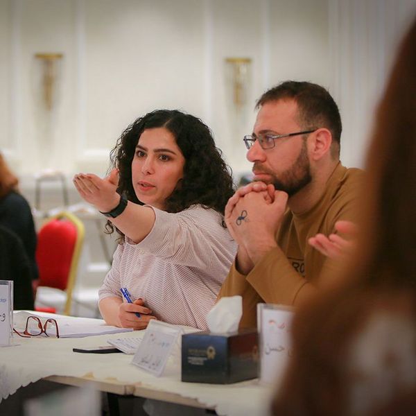 Participants of the Young Enumerators and Mediators capacity development project in Iraq during one of the training sessions