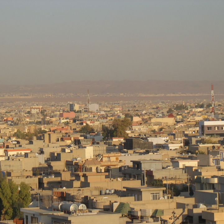 View of a city with a dusty sky.